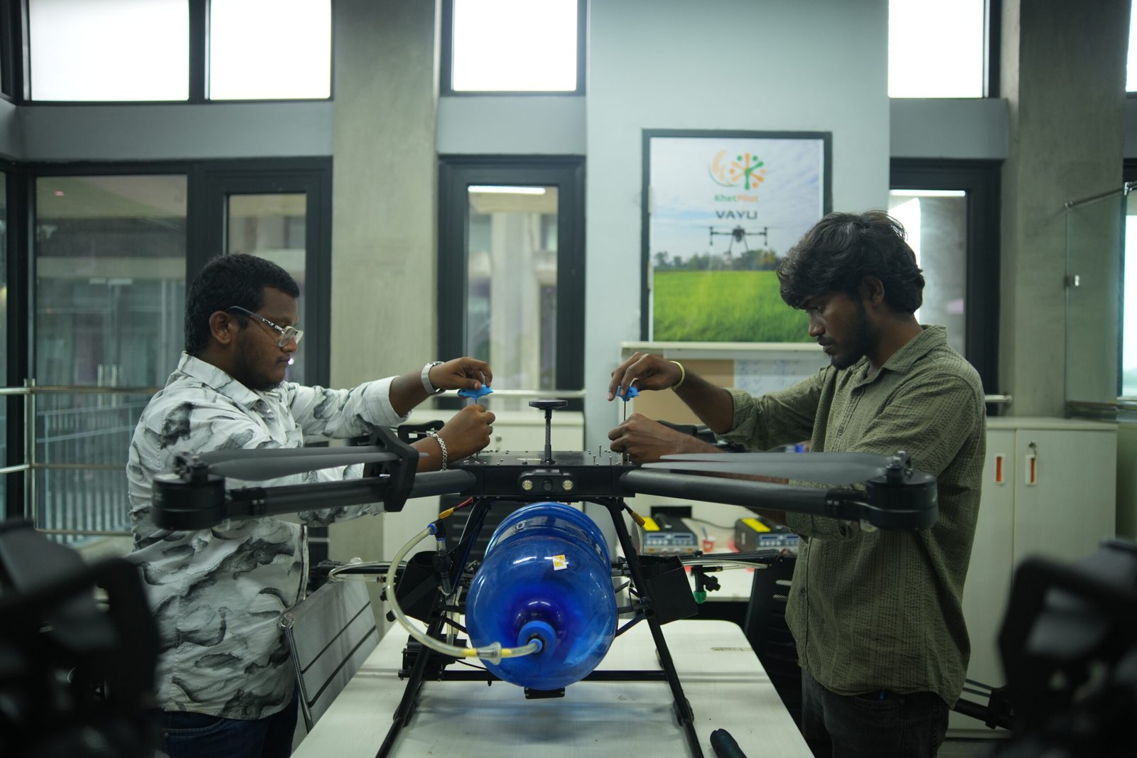 Technician working on equipment in a workshop